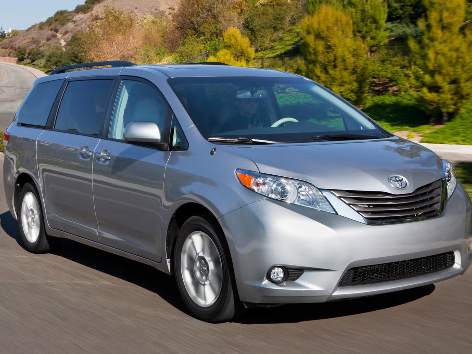 Our grey Toyota Sienna on the road